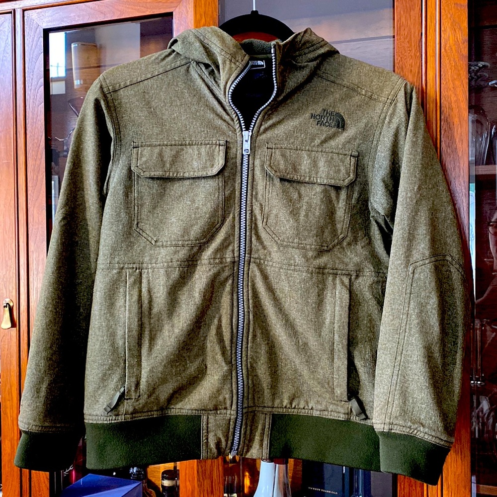 Gently used kaki spring coat. All zippers and Velcro in perfect order.